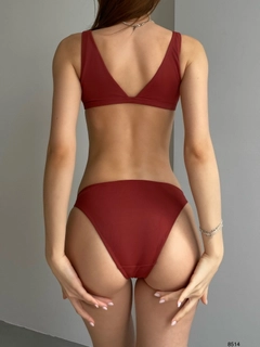 A wholesale clothing model wears 39704 - Bra Bikini Set - Brown, Turkish wholesale Swimwear of Black Fashion