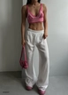 Um modelo de roupas no atacado usa bla10614-patterned-knit-crop-pink, atacado turco  de 
