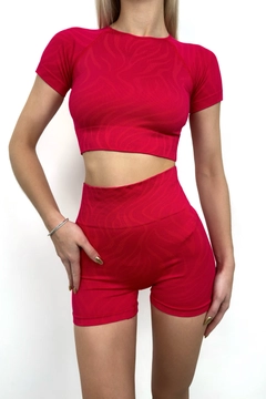 A wholesale clothing model wears BLA10657 - Half Sleeve Crop Blouse Cycling Tights Suit - Magenta Pink, Turkish wholesale Tracksuit of Black Fashion