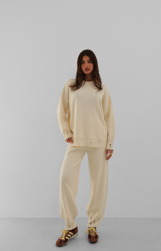 Black Fashion بدلة رياضية Jogger Knitwear بتفاصيل ممزقة إكرو ملابس بالجملة 0