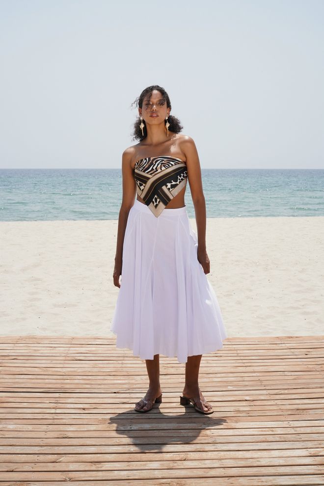 Black Fashion جيبة بيضاء متوهجة ميدي من منتصف الخصر ملابس بالجملة غير رسمي