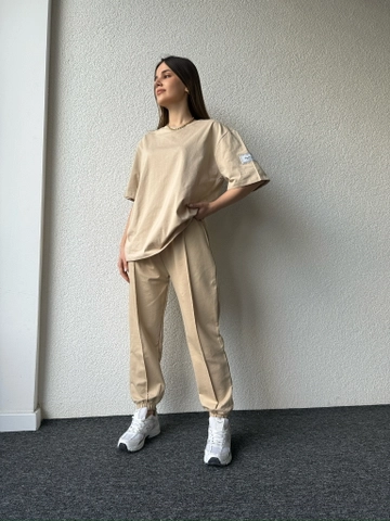 A wholesale clothing model wears  Cappitone Labeled Set Sand Beige
, Turkish wholesale Tracksuit of CAPPITONE