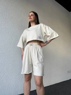 A wholesale clothing model wears cap10467-labeled-shorts-set-pole-white, Turkish wholesale Suit of CAPPITONE