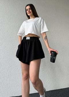 A wholesale clothing model wears cap10481-labeled-shorts-black, Turkish wholesale Shorts of CAPPITONE