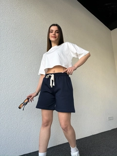 A wholesale clothing model wears cap10483-corded-long-shorts-navy-blue, Turkish wholesale Shorts of CAPPITONE