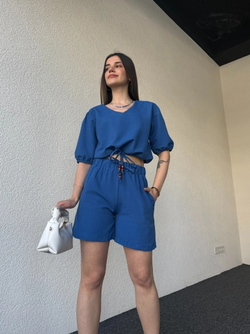 A wholesale clothing model wears  Raw Linen Shorts Set  Saks Blue
, Turkish wholesale Suit of CAPPITONE
