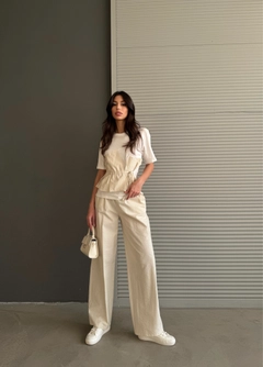 A wholesale clothing model wears cro11904-casual-trousers-stone, Turkish wholesale Pants of Cream Rouge