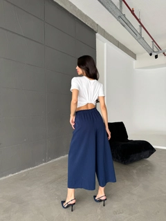 A wholesale clothing model wears cro12001-elastic-waist-trousers-navy-blue, Turkish wholesale Pants of Cream Rouge