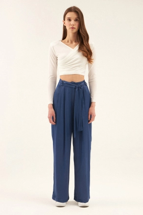 A model wears 44074 - Trousers - Indigo, wholesale undefined of Cream Rouge to display at Lonca