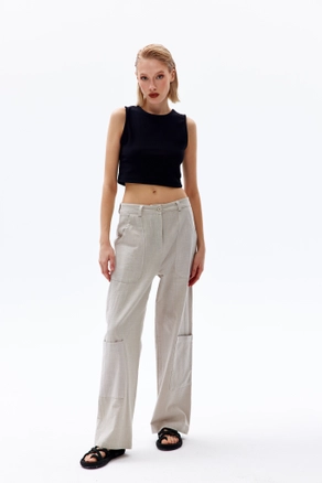 A model wears 44090 - Trousers - Stone Color, wholesale Pants of Cream Rouge to display at Lonca
