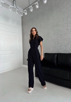 A wholesale clothing model wears CRO10380 - Front Zipper Jumpsuit - Black, Turkish wholesale Jumpsuit of Cream Rouge