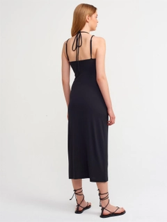 Ένα μοντέλο χονδρικής πώλησης ρούχων φοράει 16533 - Dress - Black, τούρκικο Φόρεμα χονδρικής πώλησης από Dilvin