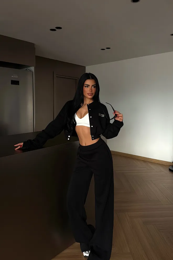 EYYO ATELIER مجموعة رياضية أسود مع جيب مائل وإغلاق فرقعة ملابس بالجملة غير رسمي