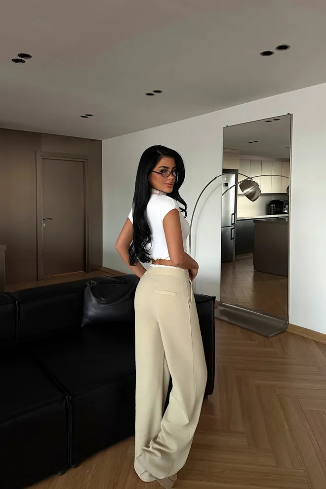 EYYO ATELIER بنطال بالازو بيج بساق عريضة ورباط ملابس بالجملة ربيع