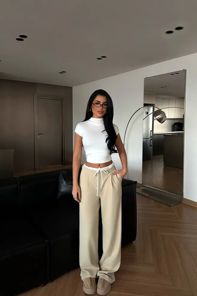 EYYO ATELIER Beżowe Spodnie Palazzo Z Szerokimi Nogawkami I Sznurkiem Hurtowa sprzedaż odzieży Skromny