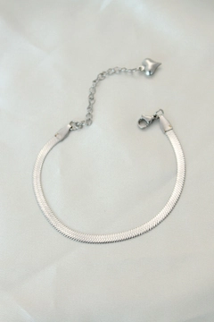A wholesale clothing model wears 20579 - Steel Bracelet - Silver, Turkish wholesale Bracelet of Ebijuteri
