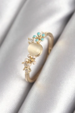 A wholesale clothing model wears ebj16997-white-with-brass-gold-color-zircon-stone-detail.-mother-of-pearl-model-women's-ring, Turkish wholesale Ring of Ebijuteri
