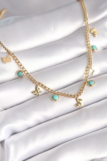 A wholesale clothing model wears  316L Steel Gold Color Blue Stone Butterfly Figure Women's Necklace
, Turkish wholesale Necklace of Ebijuteri