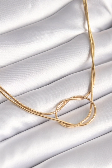 A wholesale clothing model wears  316L Steel Gold Color Knot Model Women's Necklace
, Turkish wholesale Necklace of Ebijuteri