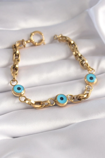 A wholesale clothing model wears  316L Steel Gold Color Thick Chain Evil Eye Bead Detail Women's Bracelet
, Turkish wholesale Bracelet of Ebijuteri