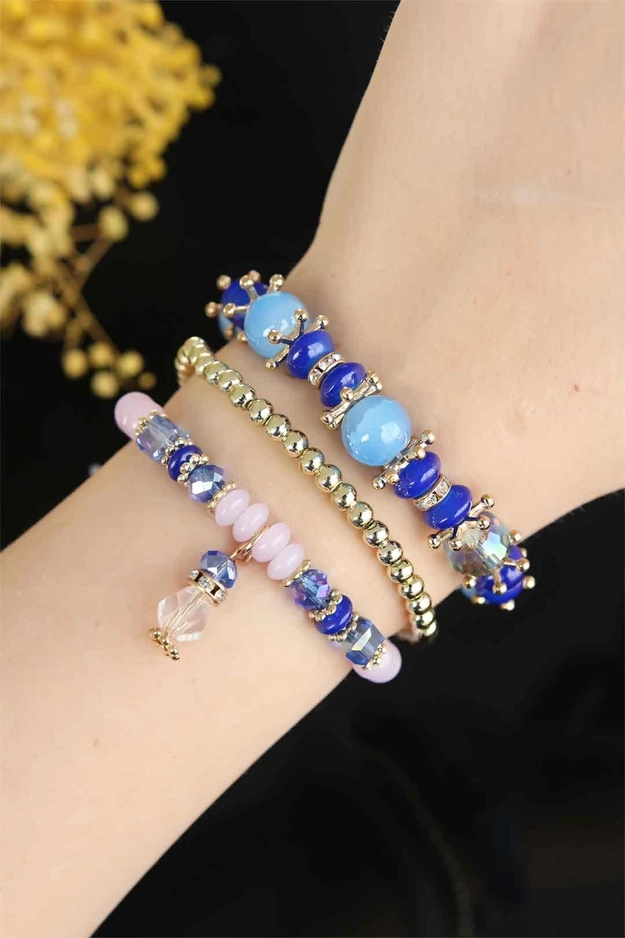 A model wears 24627 - Multiple Bracelet - Blue, wholesale Bracelet of Ebijuteri to display at Lonca