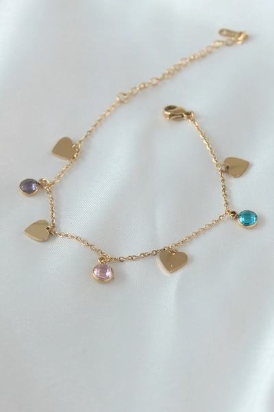 A model wears EBJ10750 - Steel Bracelet - Gold, wholesale Bracelet of Ebijuteri to display at Lonca
