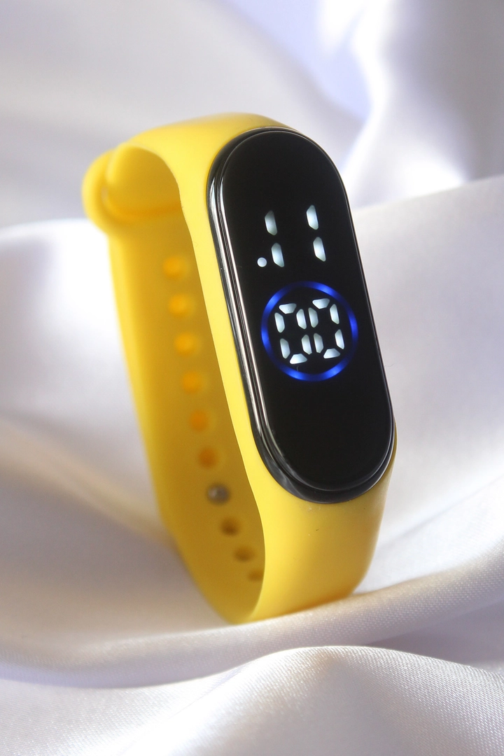 A wholesale clothing model wears EBJ10925 - Digital Clock - Yellow, Turkish wholesale Watch of Ebijuteri