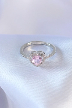 A wholesale clothing model wears EBJ12950 - Silver Color Pink Zircon Stone Heart Charm Model Brass Women's Ring, Turkish wholesale Ring of Ebijuteri