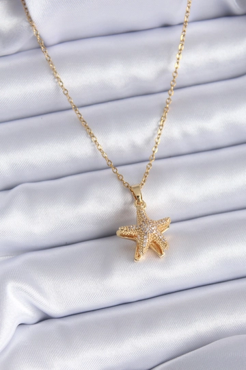 A wholesale clothing model wears  316L Steel Gold Color Zircon Stone Pop-Up Sea Star Model Pearl Detail Women's Necklace
, Turkish wholesale Necklace of Ebijuteri