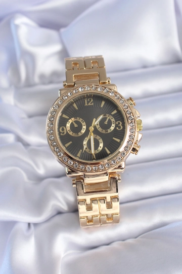 A wholesale clothing model wears  Gold Color Zircon Stone Case Black Dial Analog Metal Strap Women's Watch
, Turkish wholesale Watch of Ebijuteri