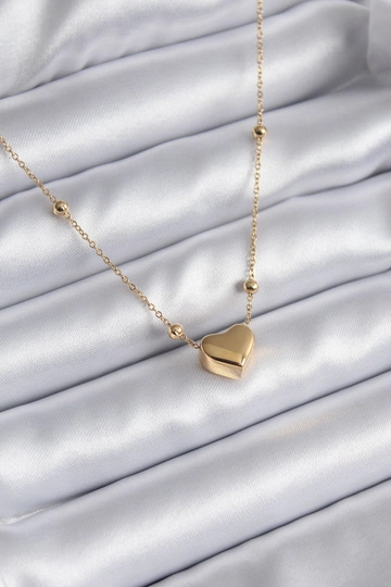 A wholesale clothing model wears  316L Steel Gold Color Heart Model Minimal Ball Detail Women's Necklace
, Turkish wholesale Necklace of Ebijuteri