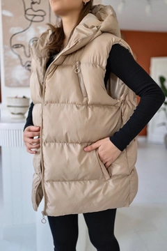 A wholesale clothing model wears ELS10023 - Hooded Inflatable Vest - Beige, Turkish wholesale Vest of Elisa