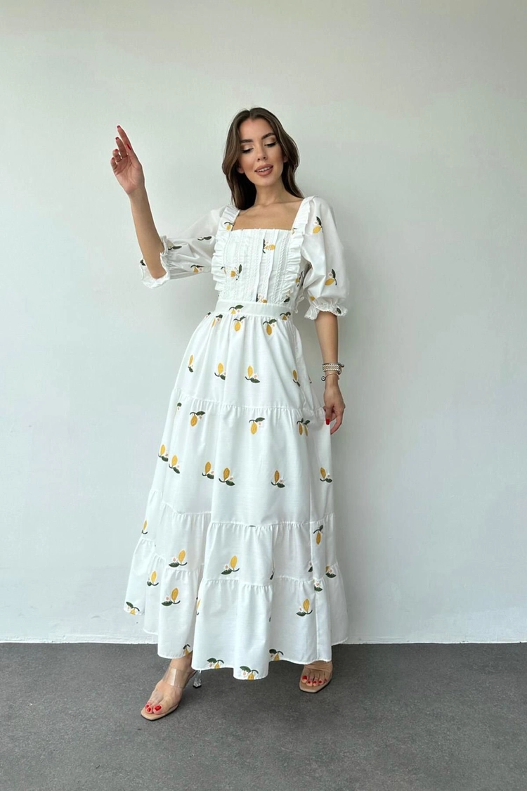 A model wears ELS10101 - Square Neck Floral Pattern Dress - Yellow & White, wholesale Dress of Elisa to display at Lonca