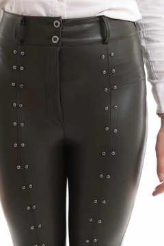A wholesale clothing model wears els11076-stone-embroidered-leather-leggings-khaki, Turkish wholesale Leggings of Elisa