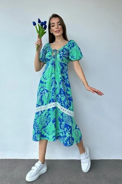 A wholesale clothing model wears els11027-breast-tie-dress-blue, Turkish wholesale Dress of Elisa