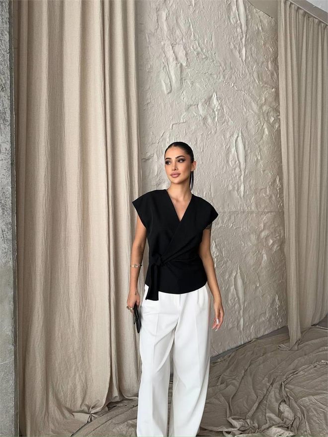 Ello Blusa Sin Mangas Con Detalle De Lazo Negro Ropa al por mayor Elegante