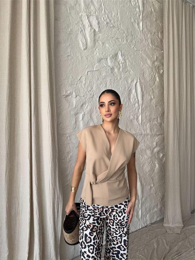 Ello Blusa Sin Mangas Con Detalle De Lazo Beige Ropa al por mayor Elegante