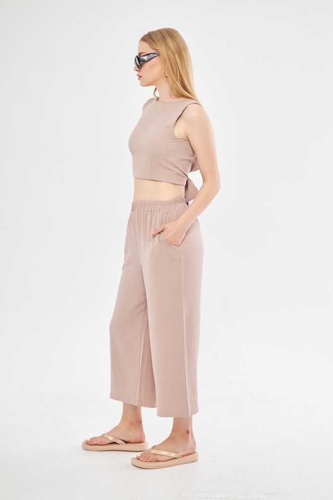 Evable Comfy Closed Neck Open Back Belted Blouse In Dusty Rose Wholesale Clothing Summer