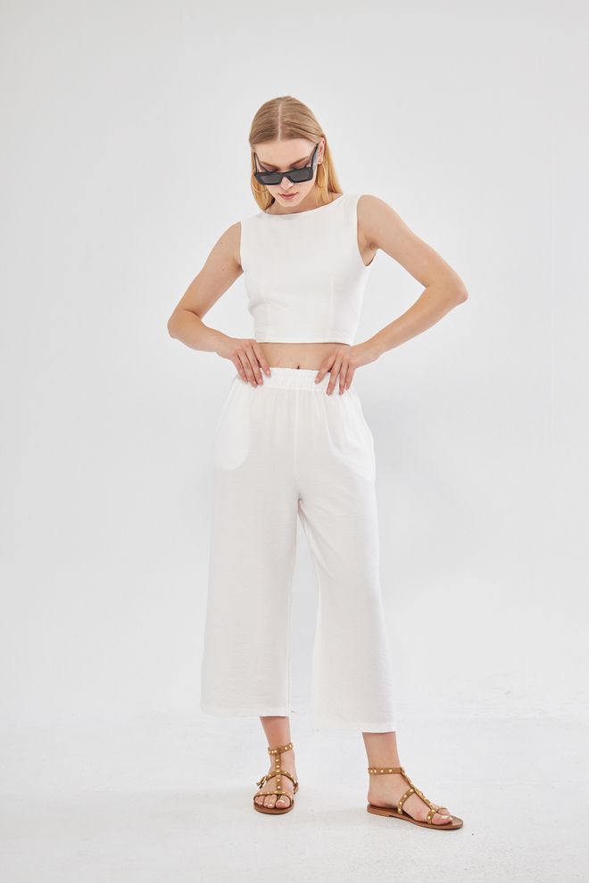 Evable Comfy Closed Neck Open Back Belted Blouse In White Wholesale Clothing 4