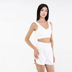 Ένα μοντέλο χονδρικής πώλησης ρούχων φοράει 20065 - Moer Bra - White, τούρκικο Crop top χονδρικής πώλησης από Evable