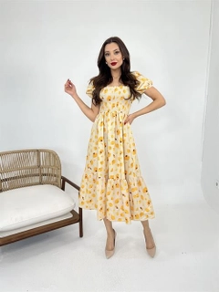 A wholesale clothing model wears fme14007-dress-yellow, Turkish wholesale Dress of Fame