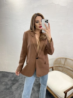 A wholesale clothing model wears 45466 - Jacket - Brown, Turkish wholesale Jacket of Fame