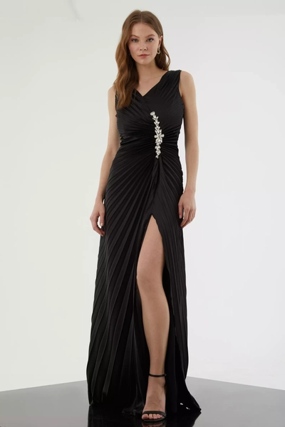 A model wears FRV10559 - Saten Sleeveless Maxi Dress, wholesale Dress of Fervente to display at Lonca
