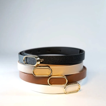 A wholesale clothing model wears  Thin Belt With Imported Oval Gold Buckle
, Turkish wholesale Belt of Fiori