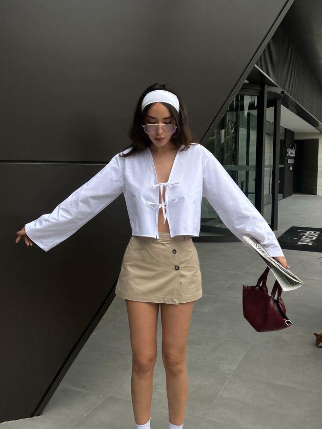 First Angels Camicetta Bianca In Popeline Con Cravatta Frontale 29085 Abbigliamento all'ingrosso Da spiaggia