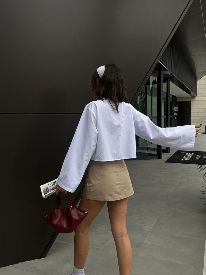 First Angels Camicetta Bianca In Popeline Con Cravatta Frontale 29085 Abbigliamento all'ingrosso Estate