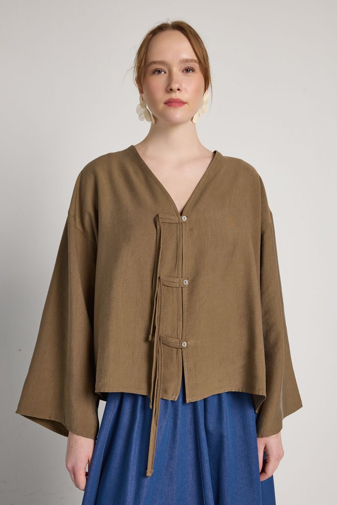 First Angels Blouson Brun Enveloppant Avec Col En V Vêtements en gros Modeste