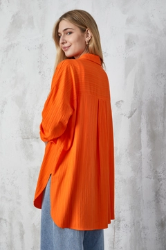 A wholesale clothing model wears fan10249-orange-textured-long-shirt, Turkish wholesale Tunic of First Angels