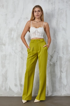 A wholesale clothing model wears fan10300-green-atlas-fabric-palazzo-trousers, Turkish wholesale Pants of First Angels
