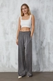 A wholesale clothing model wears fan10308-anthracite-crinkle-lurex-loose-cut-trousers, Turkish wholesale  of 